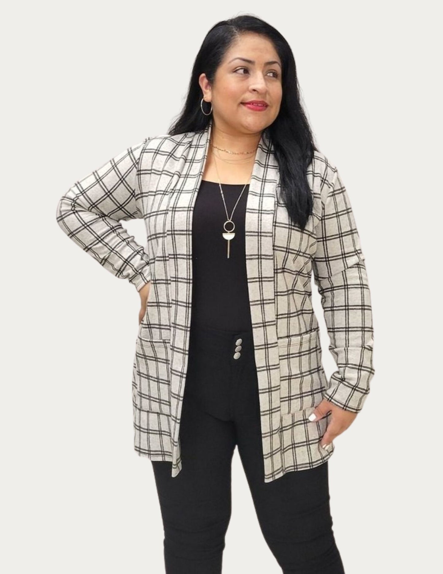 Cardigan with plaid design and long sleeves and front pockets